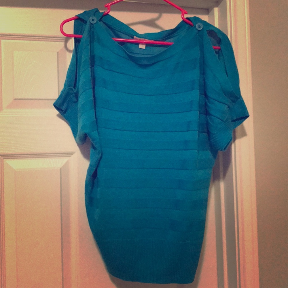 blue open shoulder shirt